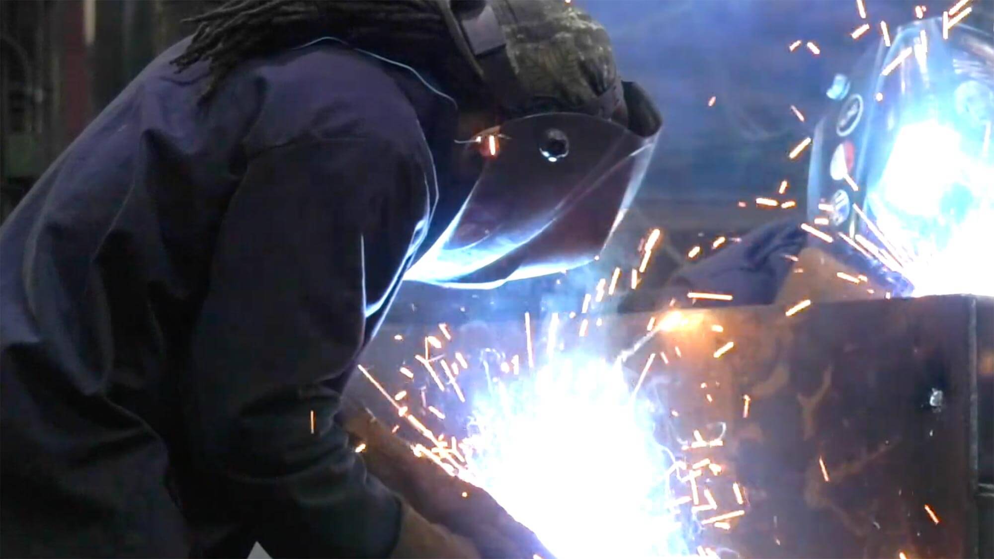 Marathon Worker Welding in Production Environment